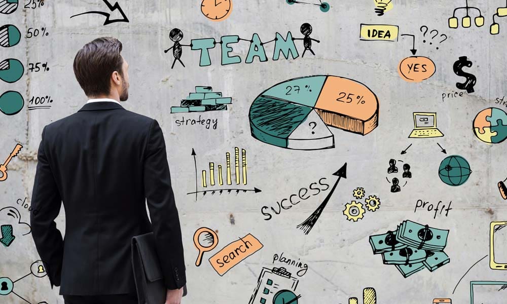 The Numbers Dont Lie Unless You Let Them - Businessman Staring at a Concrete Wall Filled with Colorful Sketches Depicting Risk Management Options