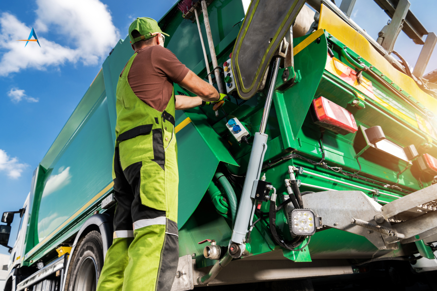 An image of a man on a green garbage truck