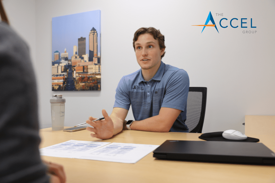 A photo of employee benefits sales executive, Joe Krueger, talking with a client